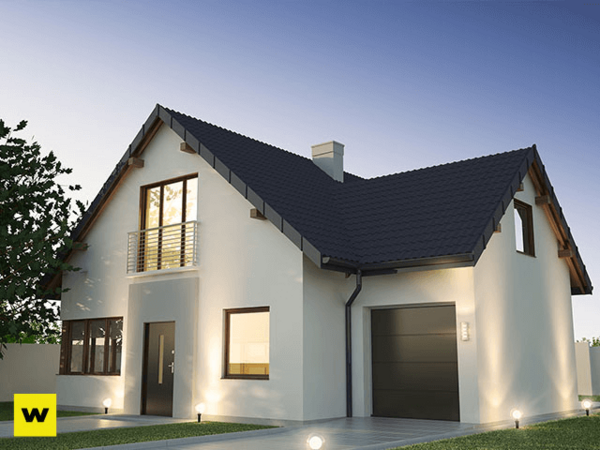 Modernes Einfamilienhaus mit Satteldach, Garage und großem Fenster im Abendlicht